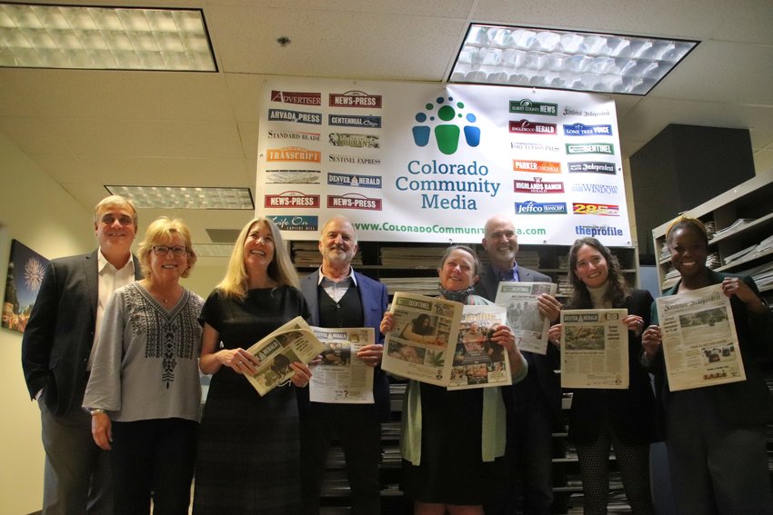 Jerry and Ann Healey, left, sold Colorado Community Media to a national and local partnership between the National Trust for Local News and the Colorado Sun designed to bolster local journalism. From left: Jerry Healey and Ann Healey, former CCM owners, Fraser Nelson and Marc Hand of the National Trust for Local News, Colorado Sun editors  Dana Coffield and Larry Ryckman, National Trust CEO Elizabeth Hansen Shapiro, and Lillian Ruiz of the National Trust.
Photo by David Gilbert